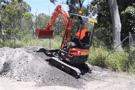 mini excavator steep hill|mini ex up hill.